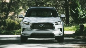 Close view of the front of a parked, white 2020 INFINITI QX50 | INFINITI Dealer in Ellisville, MO