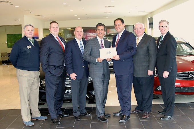 Image of John Bommarito and Associates Receiving Award at Bommarito INFINITI